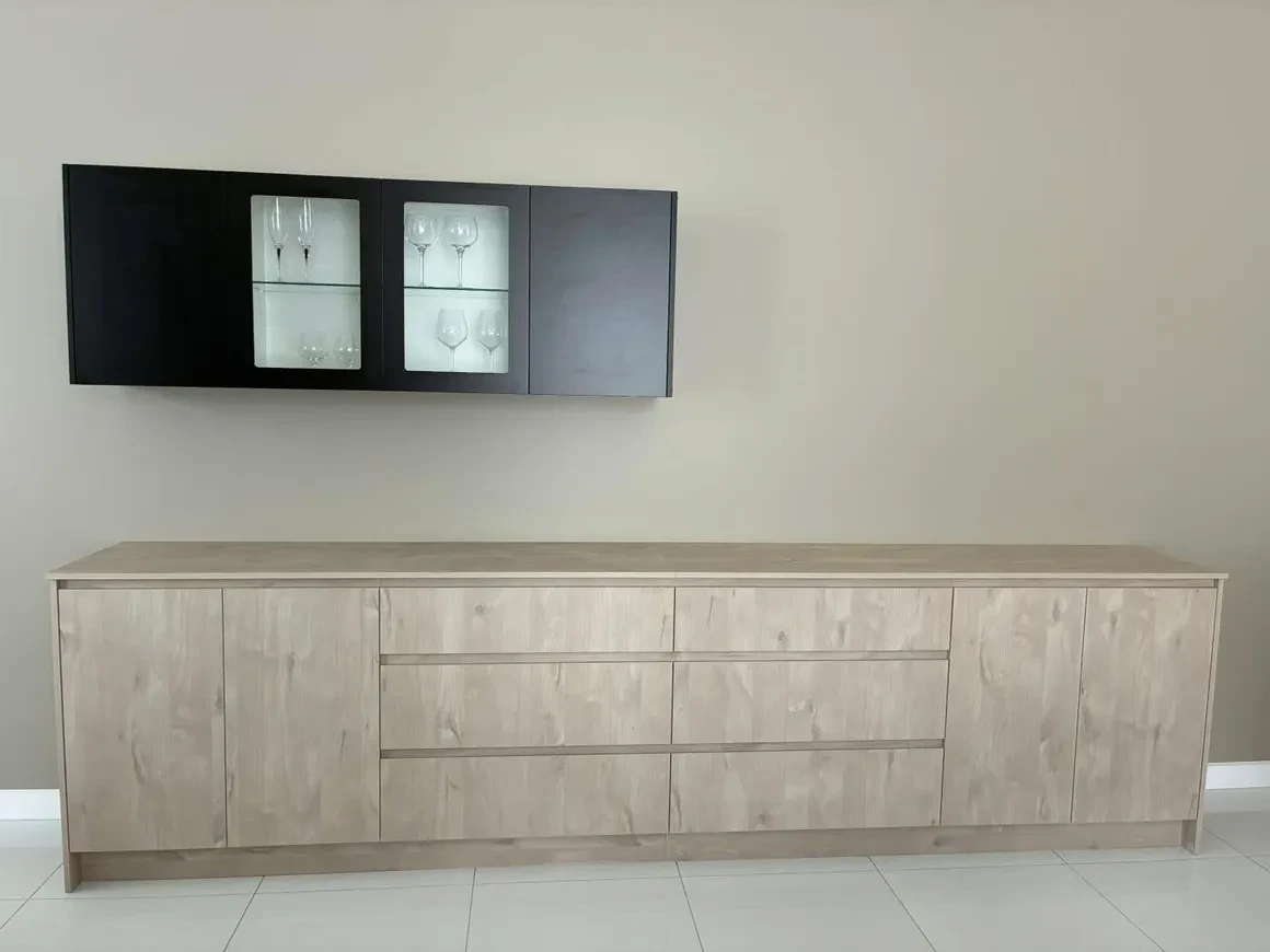 Custom timber bar unit with black glass display cabinets and wine glass storage, Pelican Waters
