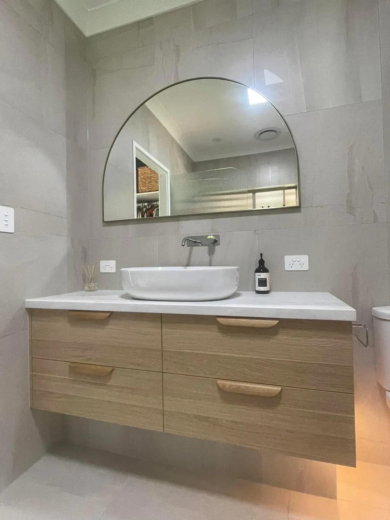 Custom white bathroom vanity with stone top and soft-close drawers, Kawana